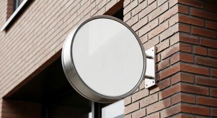 Mockup, showcase your brand with this eye-catching blank round sign on a classic brick wall, perfect for restaurants, cafes, or boutiques outdoor advertising