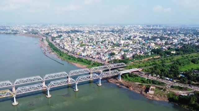 Aerial view of a indian railway bridge and lots of indian city houses. Cuttack City Aerial View