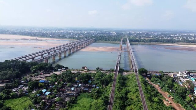 Aerial view of Indian Railway bridge and a Highway near Cuttack city India.