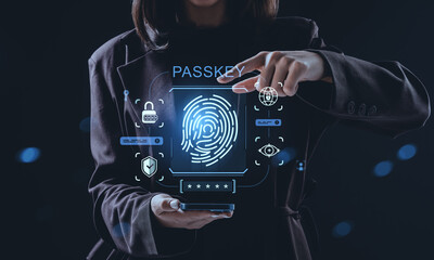 Woman using fingerprint biometric passkey interface for digital