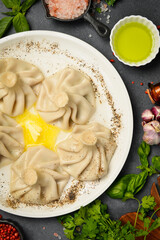 Traditional georgian dumplings, khinkali with meat. Khinkali on a plate.