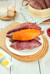 Fresh Sweet Potatoes on Wooden Board with Orange Flesh Kitchen Food Photography