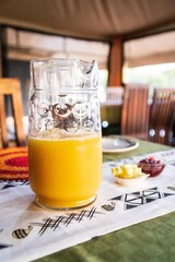 Orange Juice Pitcher with Pineapple and Berries