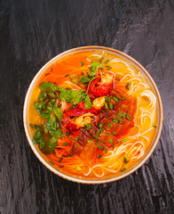 Spicy Shrimp and Bacon Noodle Soup with Handrolled Noodles and Fresh Herbs
