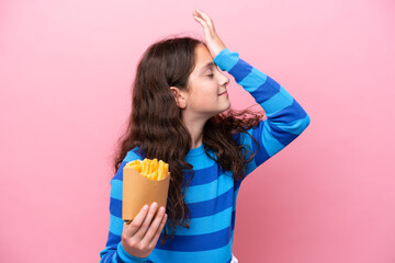 Little caucasian girl celebrating a birthday isolated on white background has realized something...