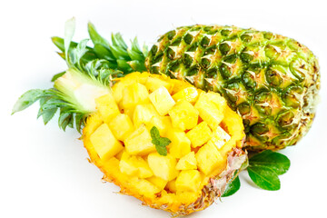 Fresh Pineapple Cut in Half with Golden Diced Flesh and Green Crown