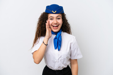 Airplane stewardess Arab woman isolated on white background shouting with mouth wide open