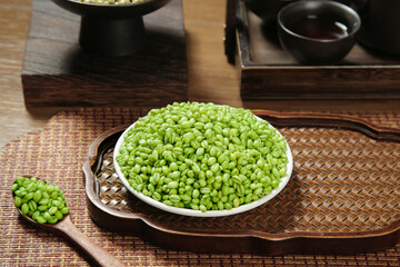 Fresh Green Mung Bean Kernels in Bowl on Wooden Tray - Healthy Asian Cooking Ingredient