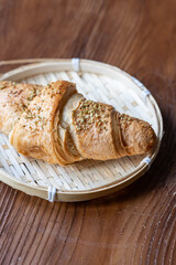 Close-Up of Pistachio and Cream Croissant on a Plate
