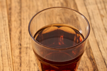 Tea poured into the cup