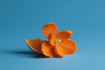 man with wet hair taken after intense workout stands confidently in clear sunny day