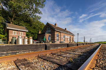 Railway tracks in front of the old Twisk station of the Hoorn–Medemblik steam tram. Between Hoorn...