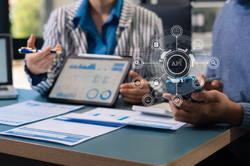 Modern technology and networking concept, Hand touching smartphone with virtual screen API icon Software development tool. API Application Programming Interface.