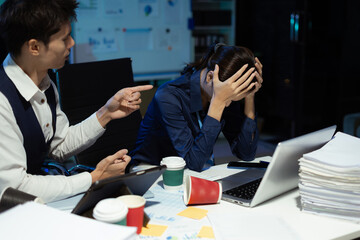 Colleague angry and blames the people for poor work, business people failure is not satisfied with the report.