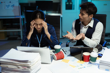 Colleague angry and blames the people for poor work, business people failure is not satisfied with the report.