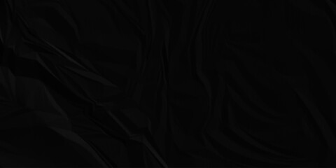 Black crumpled paper creased grunge texture. Paper wrinkled surface glued paper poster background.