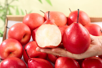 Fresh Red Pears from Shaanxi China - Imported Fruit Display with Sliced Pear Showing Interior