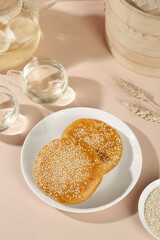 Traditional Chinese Sesame Sugar Cake Pastries with Tea Service Beijing Style Dessert