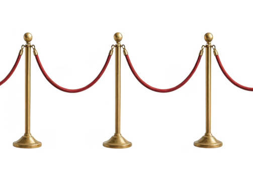 Elegant golden stanchions with red velvet ropes creating a barrier on a black background