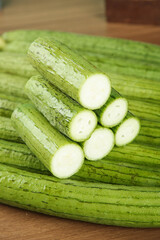 Fresh Long Loofah Vegetables from Shandong China on Banana Leaf - Asian Cooking Ingredient