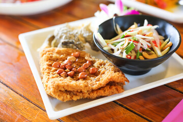 Crispy catfish salad with seafood sauce