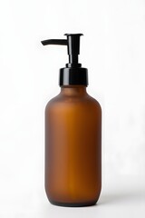 Fototapeta premium Amber glass bottle with black pump dispenser for lotions and soaps on white background