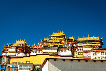 Songzanlin Monastery with clear blue sky.