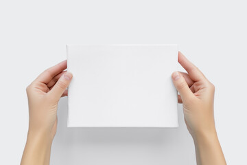 Hands Holding Blank White Canvas Mockup