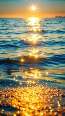 Warm sunlight creates a dazzling display of sparkles on the calm ocean surface as glittering waves kiss the shore