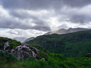 Overlook of the scenic Gap of Dunloe mountains on a cloudy day in County Kerry, Ireland.