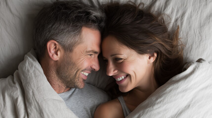 Couple sharing a joyful moment together in bed during a cozy morning at home Generative AI