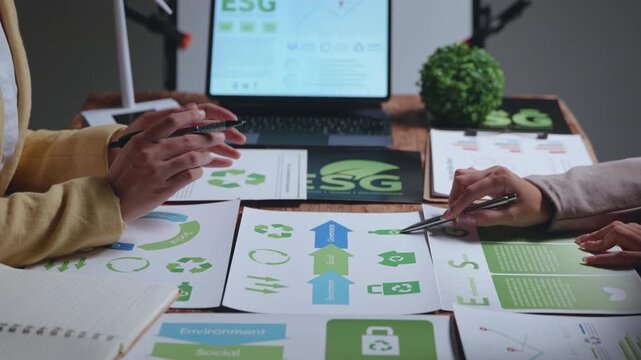 Analyzing Renewable Energy Trends Conference Room Business Meeting Professional Environment Close-Up View Data-Driven Insights