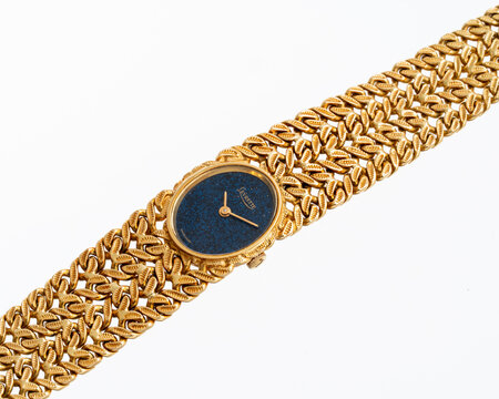 Levrette hand-wound watch, 1970s, reference 4222, 18kt yellow gold case and integrated bracelet with blue dial. Milan, Italy, April 14, 2025