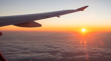 Fototapeta premium Experience the magic of flight at sunset with airplane wing over clouds, evoking freedom, adventure, and travel inspiration for wanderlust travelers