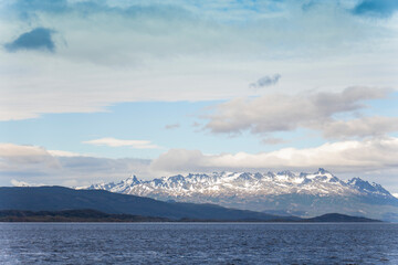 Navigating the Beagle channel from Ushuaia with sea lions, whales, penguins and various bird species, and the iconic Les Eclaireurs Lighthouse.