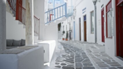 Whitewashed mediterranean alley with stone paving, soft defocused bokeh alley; background copyspace backplate calm.