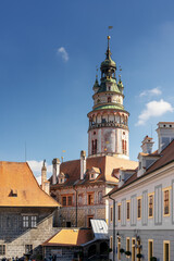vertical view of the castle tower and colourful buildings in the historic city center of Cesky Krumlov