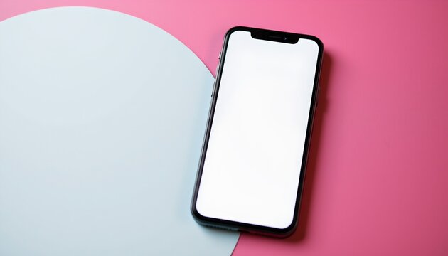 An Apple iPhone 12 Pro in a white case with pink accents on a pink background. The phone is placed on a surface with some other items