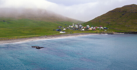 view of the village of Husavik on Sandoy in the Faroe Islands