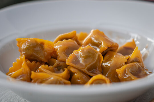 "Plin" (pinch) Ravioli are so called because of the pinch the fingers have to do in order to close them. You will find them in Piemonte, in the North