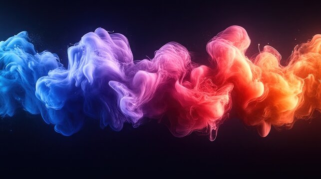 Abstract swirling ink colors on black background