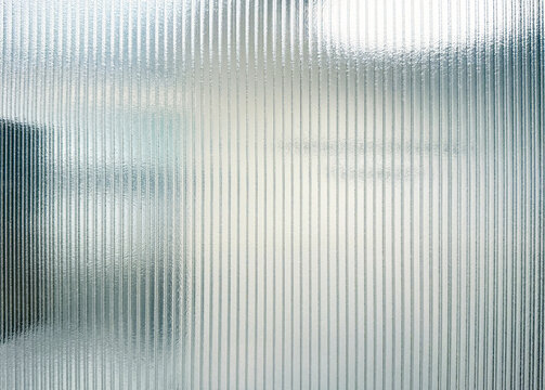 Blurred translucent polycarbonate wall panels pattern.
