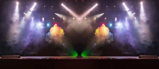 Сoncert on scene theater, stage light with colored spotlights and smoke.