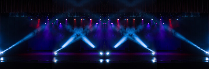 Сoncert on scene theater, stage light with colored spotlights and smoke.