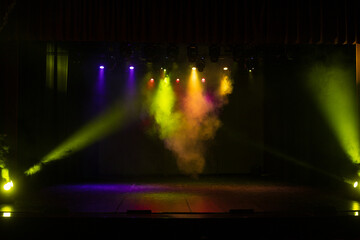 scene, stage light with colored spotlights and smoke