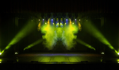 scene, stage light with colored spotlights and smoke