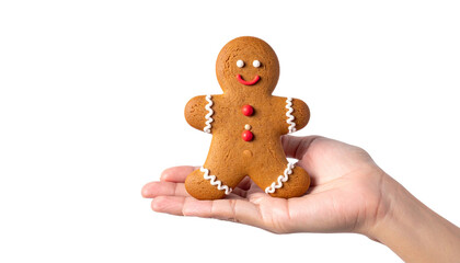 A charming gingerbread man presented on a welcoming hand. The cookie features an adorable expression and festive decorations