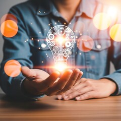 Businessman holding light bulb with gears, representing idea generation