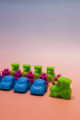 Minimal children toys layout with bright vehicles on pastel mockup backdrop