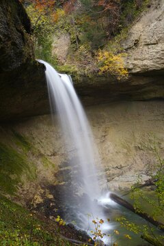 scheidegg waterfalls (allg&auml;u, bavaria, germany) in bulb exposure in autumn